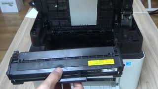 Samsung Xpress M2070 M2070W M2070F M2070FW  Replacing the Toner Cartridge [upl. by Saimon]