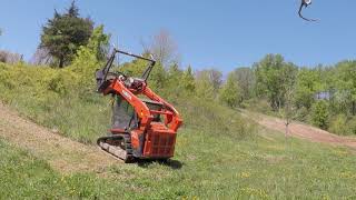 Hillside Cleanup with the Kubota SVL 752 and Loftness Battle AX Light [upl. by Alikat547]