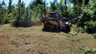 Loftness Battle Ax on Deere 333G [upl. by Etnomed]