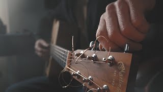 How To Tune Guitar a Half Step Down and Why [upl. by Oetsira168]